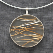 Forged Silver and Gold Pendant