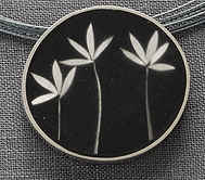 Three flower stem black resin pendant